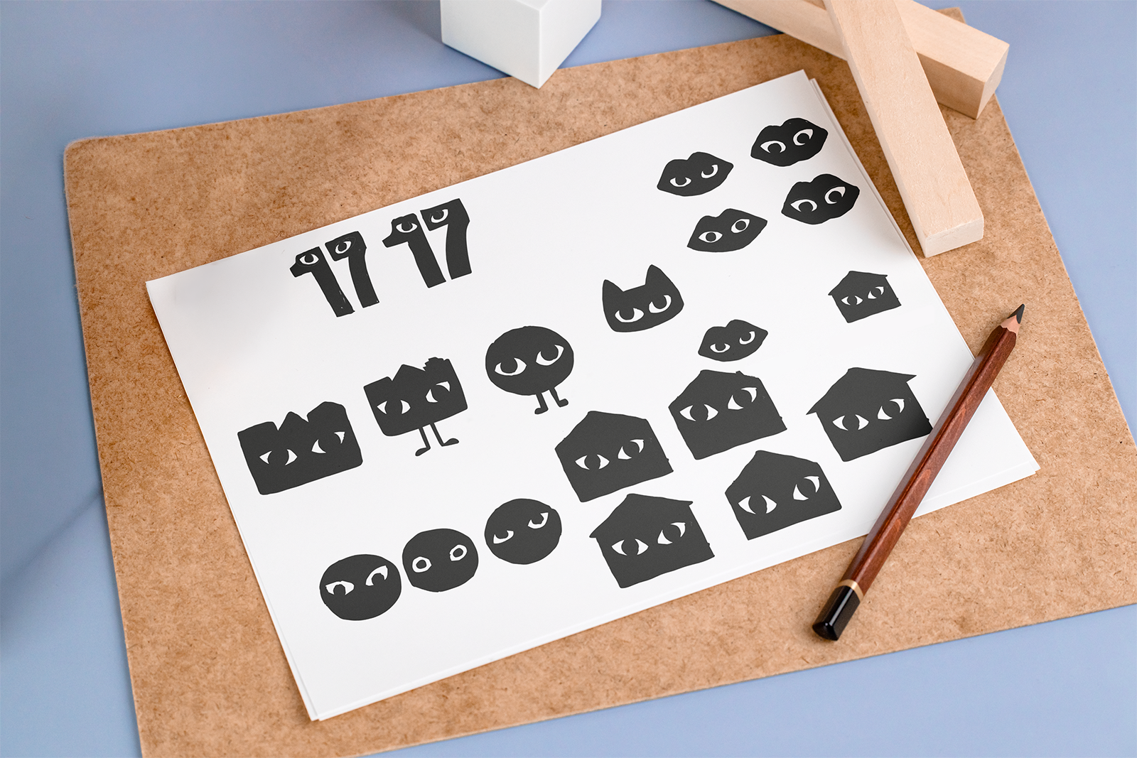 Recherches graphiques du logo Appart 17 avec variations de têtes de chat